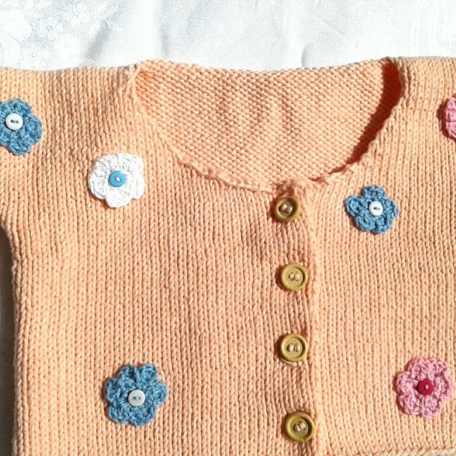 Bio Strickjacke Baby in Apricot und der Größe 80/86 - Shop Pekusch